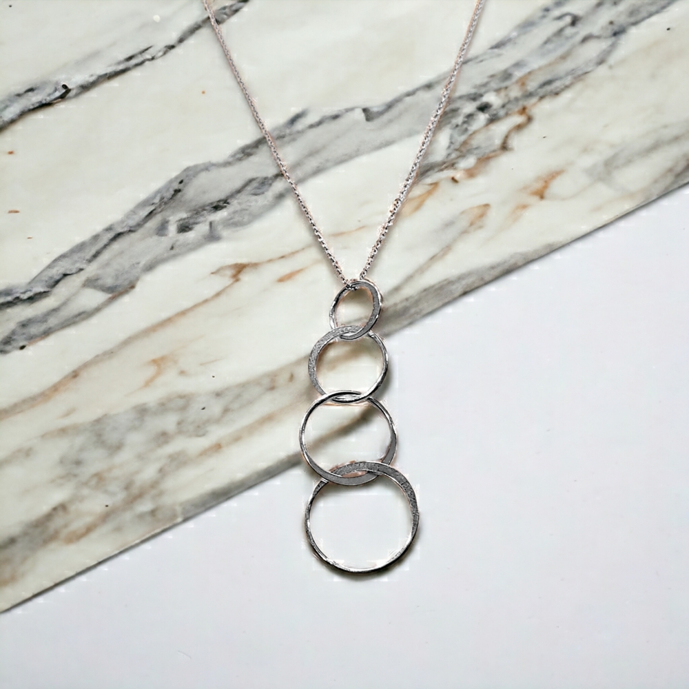 .925 sterling silver necklace with interlinked circle pendant